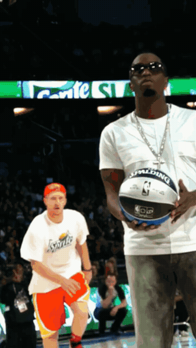 Man Holding Spalding Basketball GIF