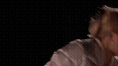 Man Holding Spoon In Mouth In Woods GIF