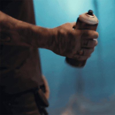 Man Holding Spray Can