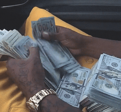 Man Holding Stack Of 100 Dollar Bills GIF