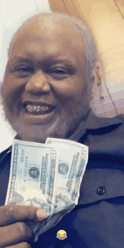 Man Holding Stack Of 20 Dollar Bills Smiling GIF