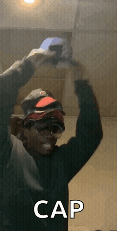 Man Holding Stack Of Hats GIF