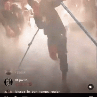 Man Holding Stick In Foggy Room GIF