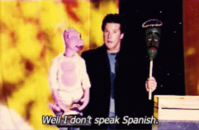 Man Holding Stick Saying Well I Don't Speak Spanish GIF