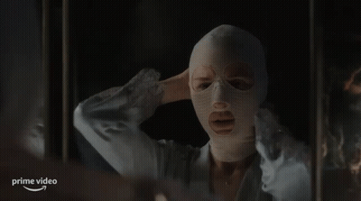 Man Holding Stick With Eyes Closed GIF