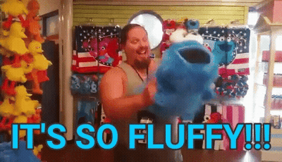 Man Holding Stuffed Animal Saying It's So Fluffy GIF