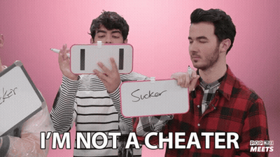 Man Holding Sucker Sign Says I'm Not A Cheater GIF