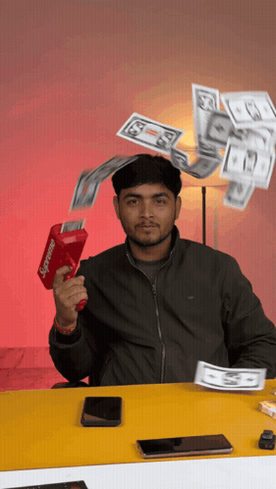 Man Holding Supreme Money Gun With Falling Cash GIF