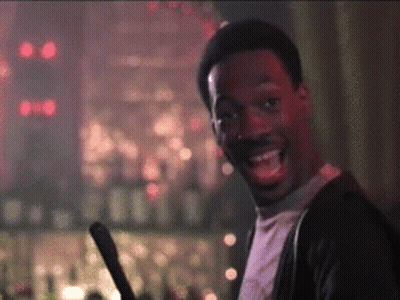 Man Holding Sword And Smiling GIF