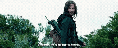 Man Holding Sword In Forest Saying Gentlemen We Do Not Stop Till Nightfall GIF