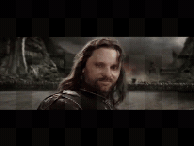 Man Holding Sword In Front Of Castle GIF