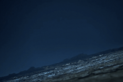 Man Holding Sword Next To Mickey Mouse GIF