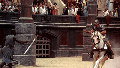 Man Holding Sword Riding Horse Gladiator GIF