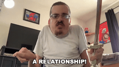 Man Holding Sword Saying A Relationship GIF