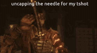 Man Holding Sword Uncapping The Needle For My Tshot GIF