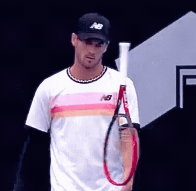 Man Holding Tennis Racquet GIF