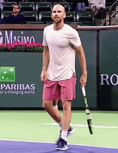 Man Holding Tennis Racquet By Pariba Advertisement GIF