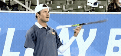 Man Holding Tennis Racquet In Front Of Lake Sign GIF