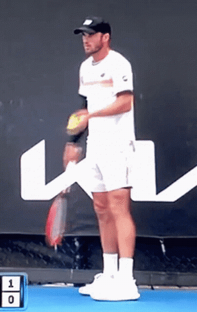 Man Holding Tennis Racquet In Front Of Sign Saying 1 0 GIF