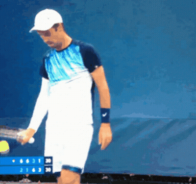 Man Holding Tennis Racquet GIF