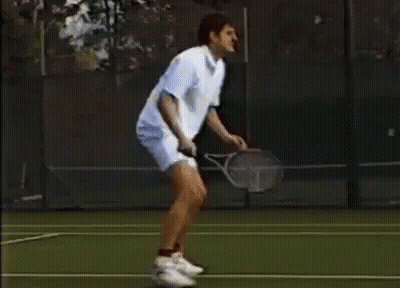Man Holding Tennis Racquet On Court GIF