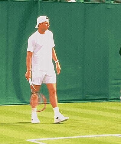 Man Holding Tennis Racquet On Court GIF