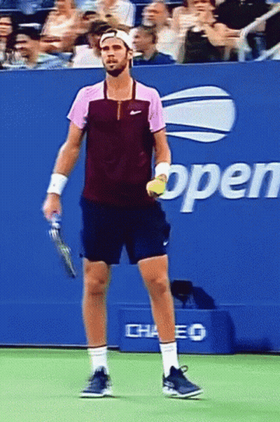 Man Holding Tennis Racquet On Court Open GIF