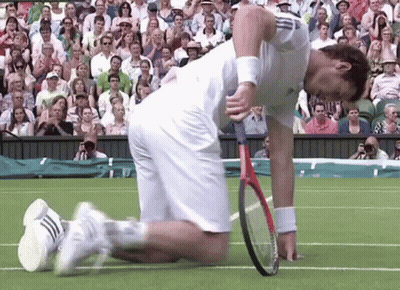 Man Holding Tennis Racquet On Knees GIF