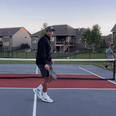 Man Holding Tennis Racquet Wearing Hat With Letter J GIF