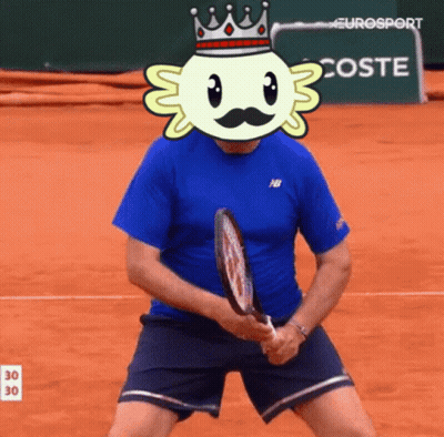 Man Holding Tennis Racquet With Cartoon Character And Crown On Head GIF