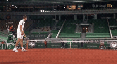 Man Holding Tennis Racquet With Emirates Fly Better Sign GIF