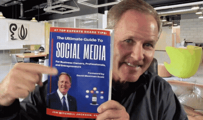 Man Holding The Ultimate Guide To Social Media GIF