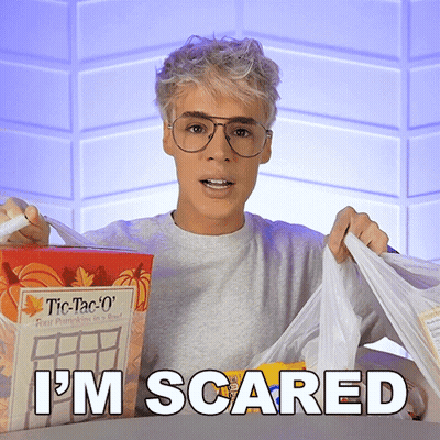Man Holding Tic Tac O's And Food Saying I'm Scared GIF