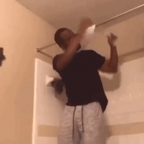 Man Holding Toilet Paper GIF