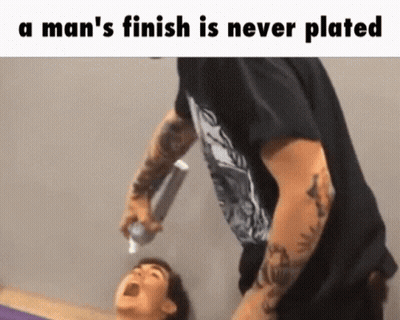 Man Holding Toothpaste Over Another Man's Head GIF