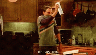 Man Holding Towel Over Face Disgusting GIF