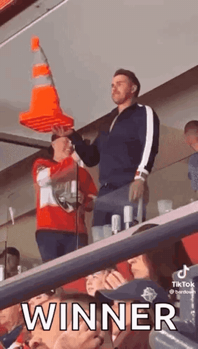 Man Holding Traffic Cone On Head GIF