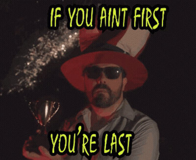 Man Holding Trophy If You Ain't First You Last GIF