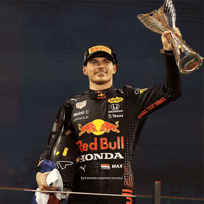 Man Holding Trophy In Front Of Star Saying 21 GIF