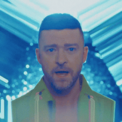 Man Holding Trophy In Front Of TV Saying VMA GIF