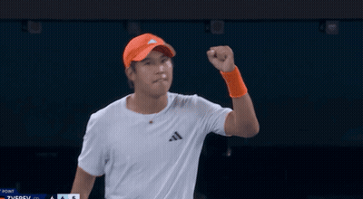 Man Holding Trophy Number 75 GIF