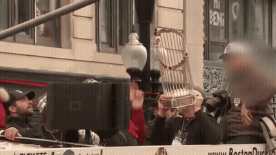 Man Holding Trophy GIF