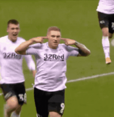 Man Holding Trophy Saying Champions GIF