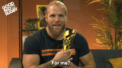 Man Holding Trophy Saying For Me GIF