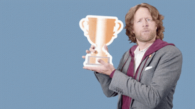 Man Holding Trophy Saying You Deserve A Trophy GIF