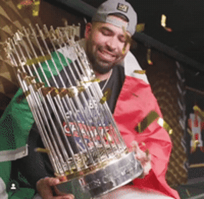 Man Holding Trophy With Canadian Flag GIF