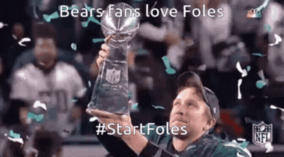 Man Holding Trophy With Confetti GIF