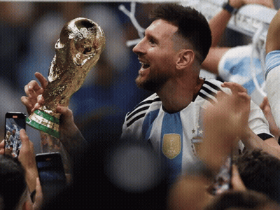 Man Holding Trophy With FIFA On Shirt GIF