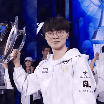 Man Holding Trophy With Hana Bank On Sleeve GIF