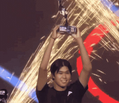 Man Holding Trophy With Number 75 GIF